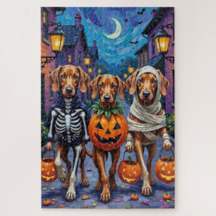 Vizsla-Hunde beim Trick-or-Treat in Halloween-Kost Puzzle