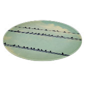 Vögel an Drähten, Vintager blauer Himmel. Schneidebrett (Ecke)