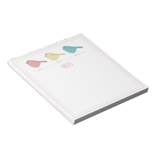 Vögel auf einem drahtlosen Notepad Notizblock (angewinkelt)