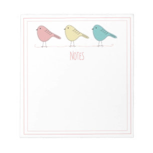 Vögel auf einem drahtlosen Notepad Notizblock