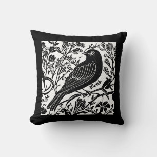 Vogel auf einer Zweigstelle mit Blume in Schwarz u Kissen