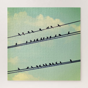 Vögel auf Leitungen, vintage blauer Himmel. Puzzle