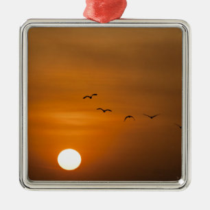 Vögel fliegen bei Sonnenuntergang Ornament Aus Metall