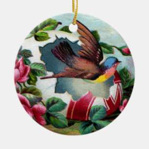 Vogel fliegt aus viktorianischem Osterei heraus Keramikornament