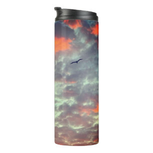Vogel fliegt rosa Wolken Himmel Foto Thermosbecher