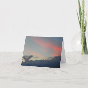 Vogel in den Wolken bei Sonnenaufgang Feiertagskarte
