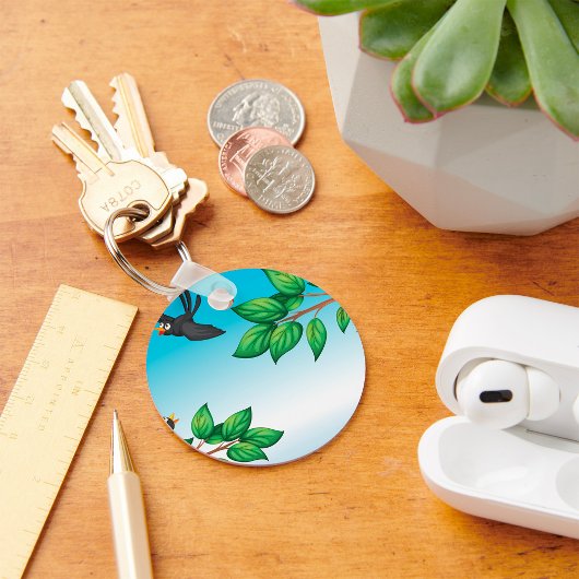 Vögel in einem Schlüsselanhänger