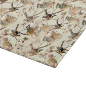 Vögel in einer Zweigstelle Schneidebrett (Ecke)