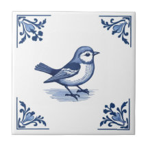 Vogel mit blau-weißen Florenkecken von Delft