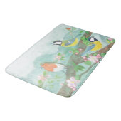 Vögel singen auf einem blühenden Baumzweig Badematte (Schrägansicht)