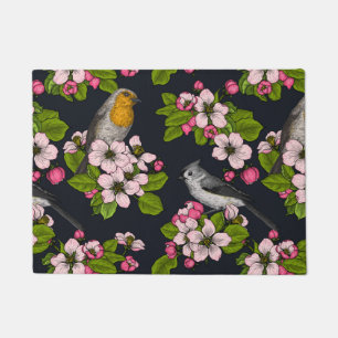 Vögel und Blüten auf schwarz Fußmatte