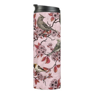 Vögel und Kirschblüten auf rosafarbenem Hintergrun Thermosbecher