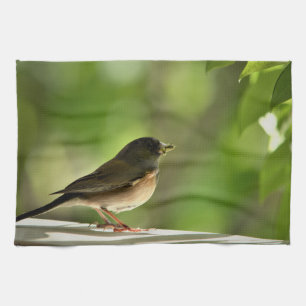 Vogel vor grünem Blätterhintergrund Geschirrtuch