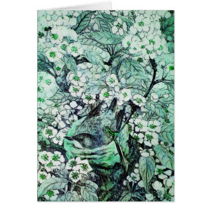 VOGELNEST, BAUM MIT GRÜNEN WEISSEN FRÜHLINGSBLUMEN