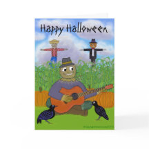 Vogelscheuche, die Gitarre spielt