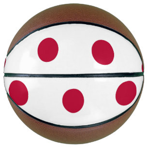 Vollständiger Basketball mit japanischer Flagge