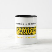 Vorsicht beim Lesen in der laufenden Tasse (Zentrum)