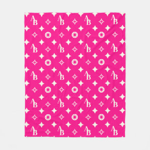 Vorzeichenloses, rosa-farbenes Monogramm-Muster Fleecedecke