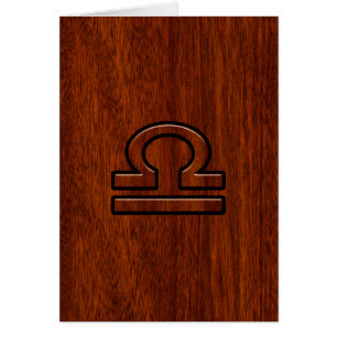 Waage-Sternzeichen-Symbol auf Mahagoni