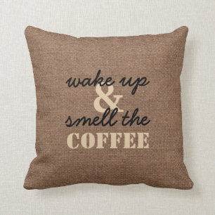 Wachen Sie auf und riechen Sie den Kaffee gegen Kissen