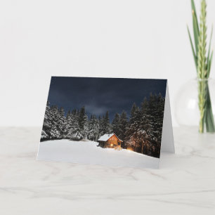 Waldkabinesnowy-Szene für Weihnachtskarte Feiertagskarte