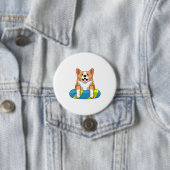 Walisischer Corgi im Schwimmen mit Brett Button (Beispiel)