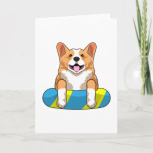 Walisischer Corgi im Schwimmen mit Brett Karte