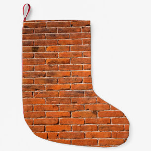 Wand aus rotem Ziegelstein Kleiner Weihnachtsstrumpf