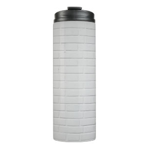 Wand aus weißem Backstein Thermosbecher