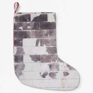 Wand aus weißem und braunem Beton Kleiner Weihnachtsstrumpf
