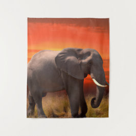 Wandkleed met Afrikaanse olifant en zonsondergang Wandteppich