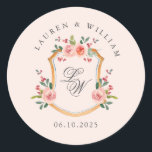 Wappen mit rosa Monogramm Hochzeit Runder Aufkleber<br><div class="desc">Elegantes Aquarellfarben-Wappen mit weichem Blumenmuster auf hellrosa Hintergrund mit einem Rundaufkleber für romantische Hochzeiten.</div>