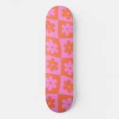 Warm karierte Retro-Blume Rosa Orange Skateboard (Vorderseite)