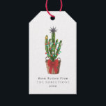Warm wünscht Cactus Christmas Geschenkanhänger<br><div class="desc">Illustration eines Kaktuskorbs in einem Korb mit einem roten Jungen. Der Kakteen ist mit Weihnachtsschmuck und Weihnachtsbeleuchtung dekoriert und mit einem Stern bedeckt. Im Text steht: "Warme Wünsche" Personalisieren Sie Name und Jahr.</div>