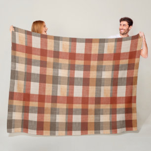 Warme Herbst-Karostoff-Textur in Rost und Beige Fleecedecke