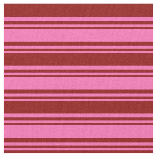 Warme rosa und dunkelrote Streifen Stoff (Nahaufnahme)