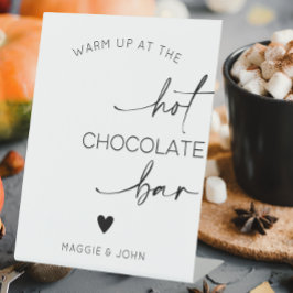 Wärmen Sie an der heißen Schokolade auf Sockelschild