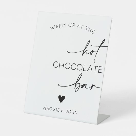 Wärmen Sie an der heißen Schokolade auf Sockelschild (Vorderseite)