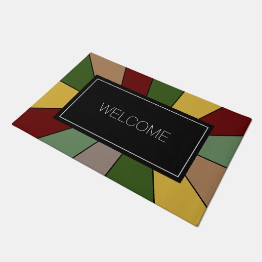 Warmes, farbenfrohes Mosaik Design auf schwarz Wil Fußmatte (Schrägansicht)