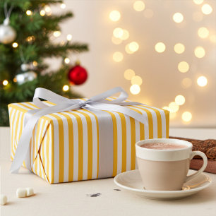 Warmes gelbes und weißes Streifenpapier Geschenkpapier