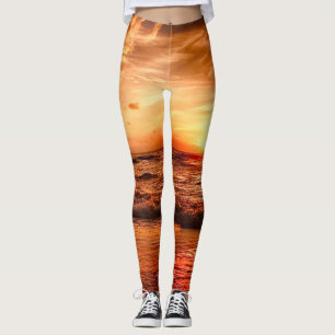 Warmes Golden Orange Sonnenuntergang über dem Ozea Leggings