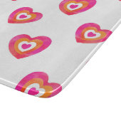 Warmes rosa Orangefarbenes Herzmuster Schneidebrett (Ecke)