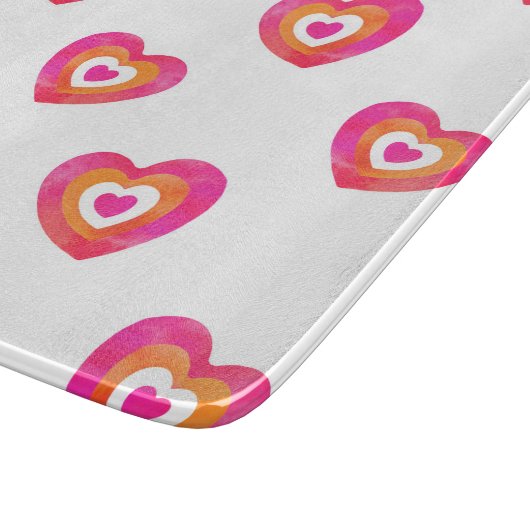 Warmes rosa Orangefarbenes Herzmuster Schneidebrett (Ecke)
