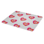 Warmes rosa Orangefarbenes Herzmuster Schneidebrett (Ecke)