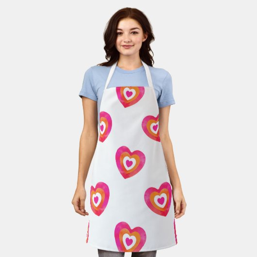 Warmes rosa Orangefarbenes Herzmuster Schürze (Getragen)