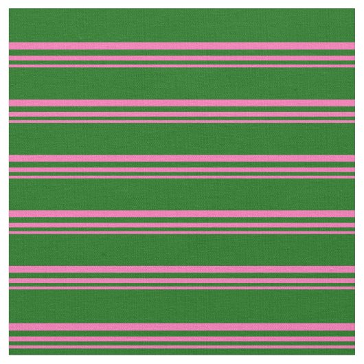 Warmes rosa und dunkelgrünes Muster Stoff (Nahaufnahme)
