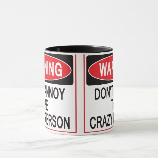 warnende Tasse der verrückten Person (Zentrum)
