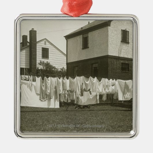 Waschende Linie außerhalb der Häuser Silbernes Ornament (Vorne)