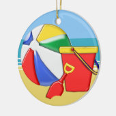 Wasserball, Eimer u. Schaufel am Ufer Keramikornament (Links)