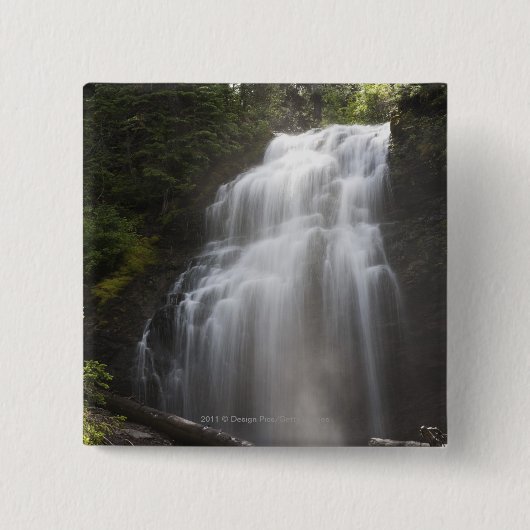 Wasserfälle, die hinunter eine Felsen-Klippe Button (Vorderseite)